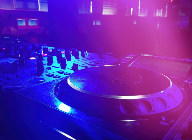 DJ booth at the night club with DJ console, closeup